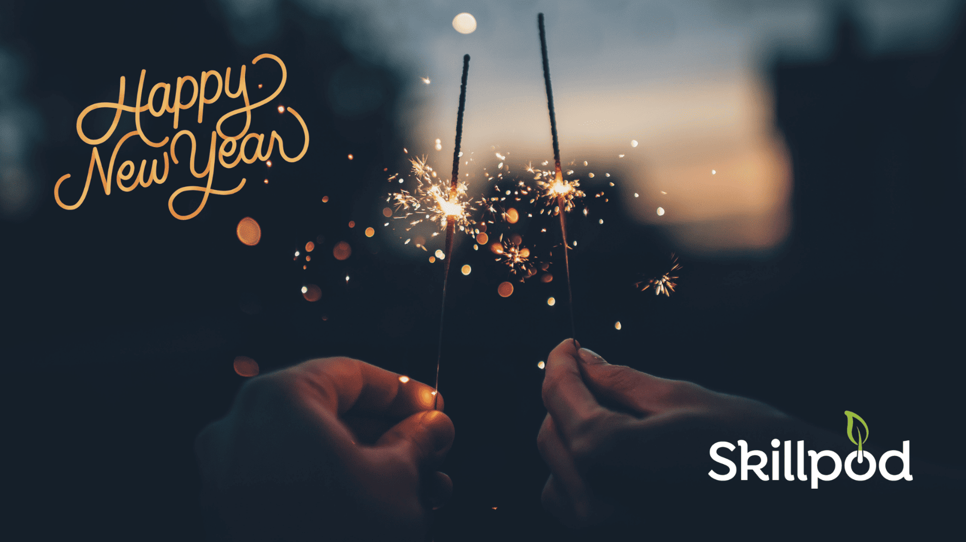 two hands holding sparklers with "happy new year" graphic